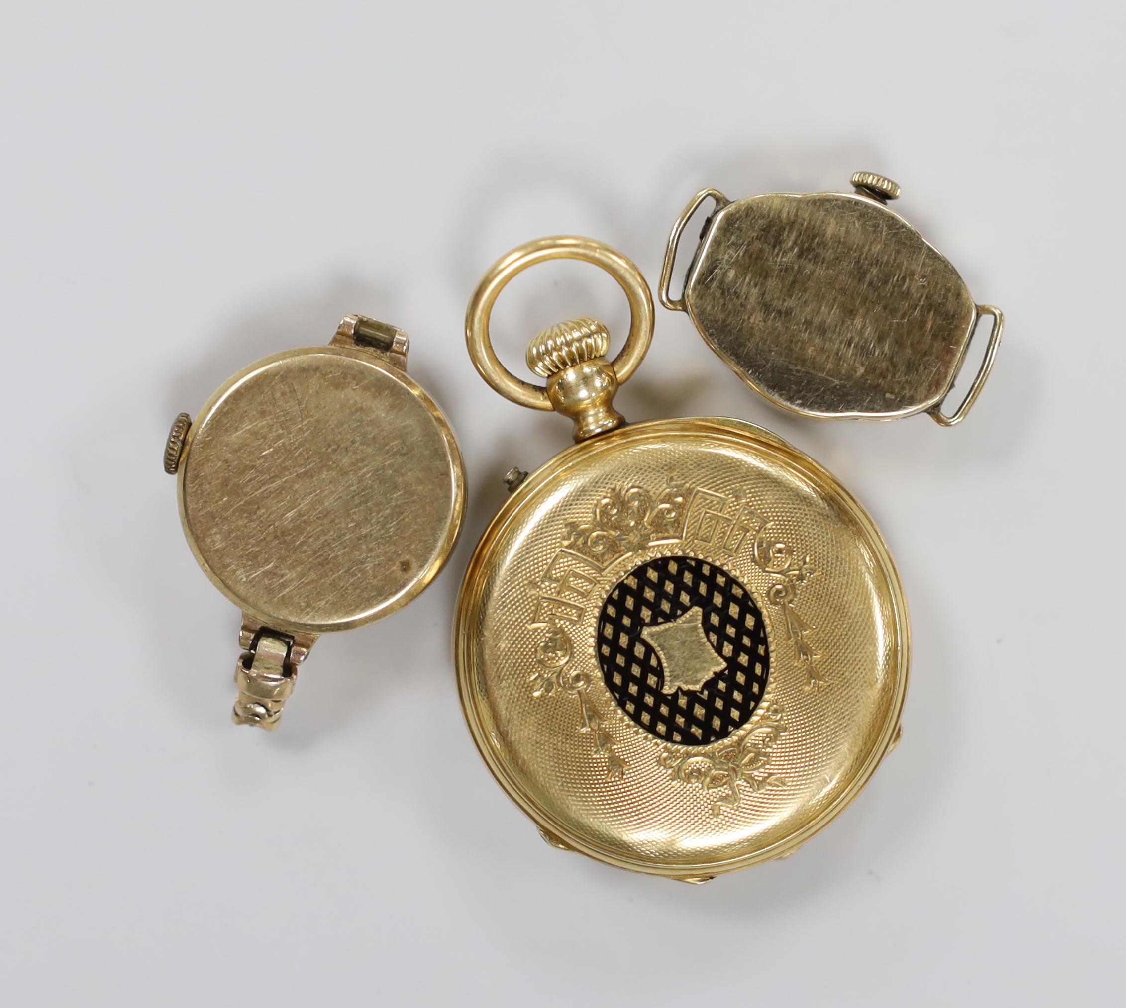 An early 20th century 18k open face fob watch, gross 32.3 grams and two lady's 9ct gold wrist watches (no straps).